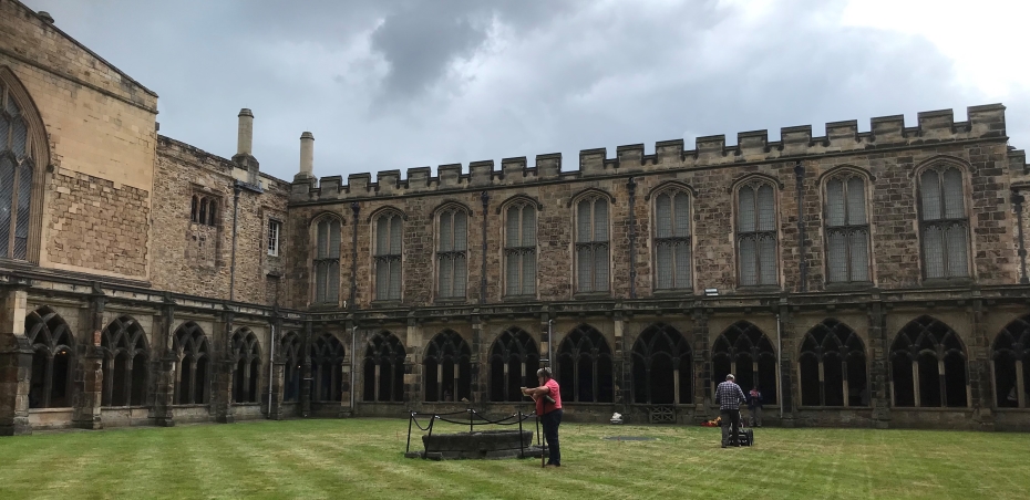 Community Archaeology Geophysics Group members doing Ground Penetrating Radar survey of the Cathedral Cloister garth